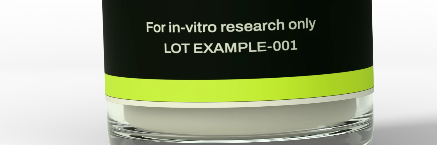 Close-up of the example LOT line on the curved label, just above the lime band and glass base